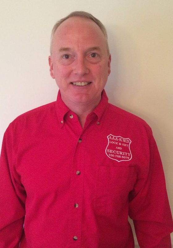 Ken Dalton, founder of AAA-KWD, in the red company shirt